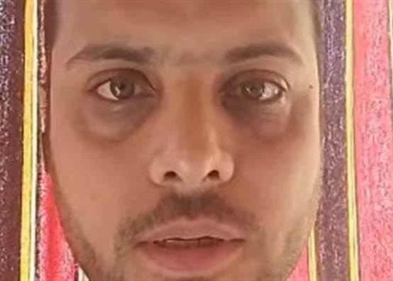والد الطفل علي 